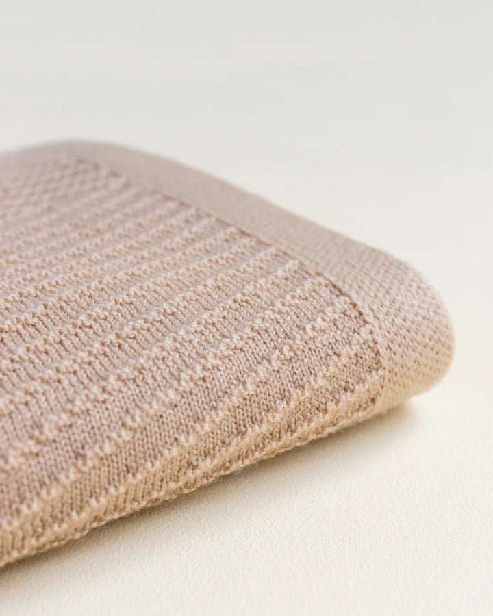 Hvid Knitwear organic merino wool baby kids blanket Akira in apricot blush pink peach