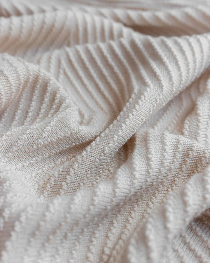 Hvid Knitwear organic merino wool baby kids blanket Akira in off-white white natural ivory neutral