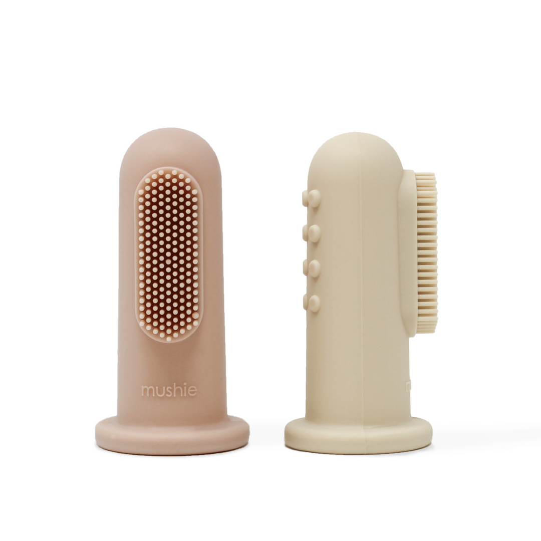 Pink and beige baby finger toothbrush