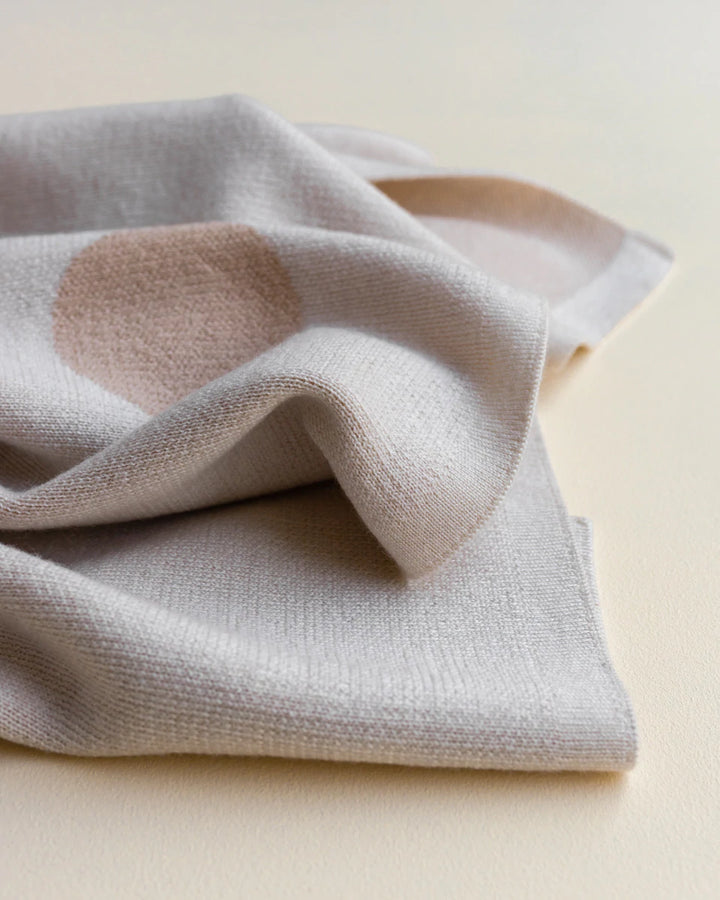 Hvid Knitwear organic merino wool baby kids blanket Edie pattern large polkadot in oat beige sand neutral apricot pink blush for newborn