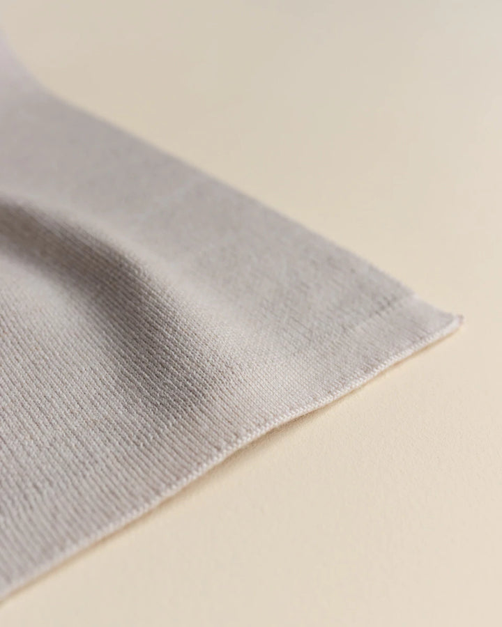 Hvid Knitwear organic merino wool baby kids blanket Edie pattern large polkadot in oat beige sand neutral rust for newborn