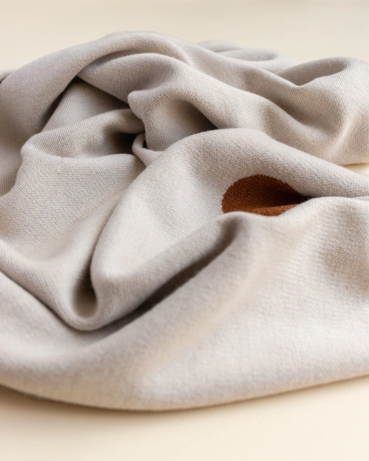 Hvid Knitwear organic merino wool baby kids blanket Edie pattern large polkadot in oat beige sand neutral rust for newborn