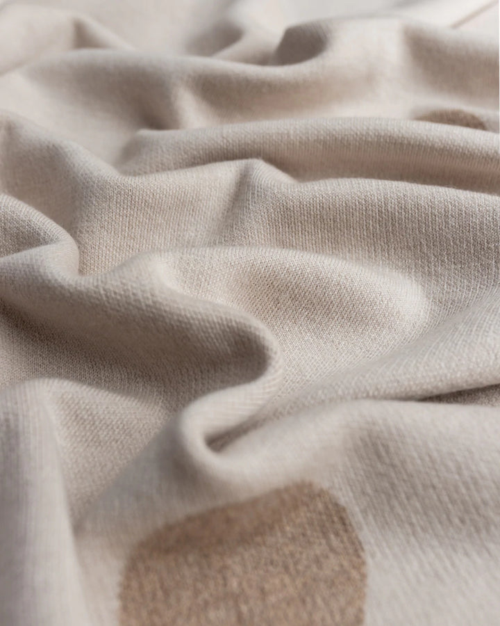 Hvid Knitwear organic merino wool baby kids blanket Edie pattern large polkadot in oat beige sand neutral for newborn