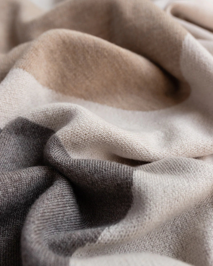 Hvid Knitwear organic merino wool large baby kids blanket Folie in otter sand with modern geometric pattern for newborn