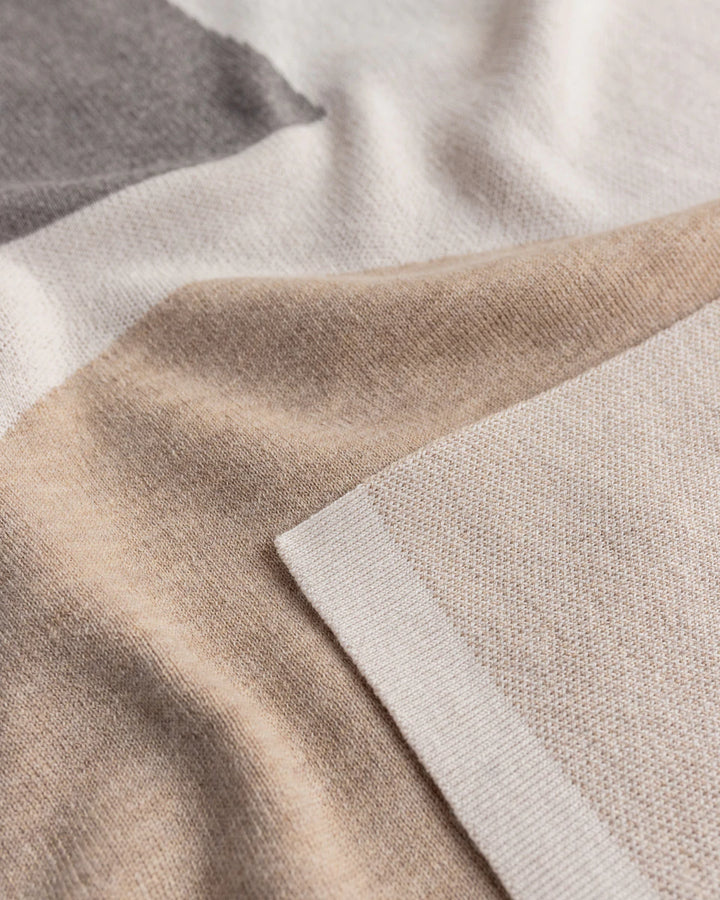 Hvid Knitwear organic merino wool large baby kids blanket Folie in otter sand with modern geometric pattern for newborn