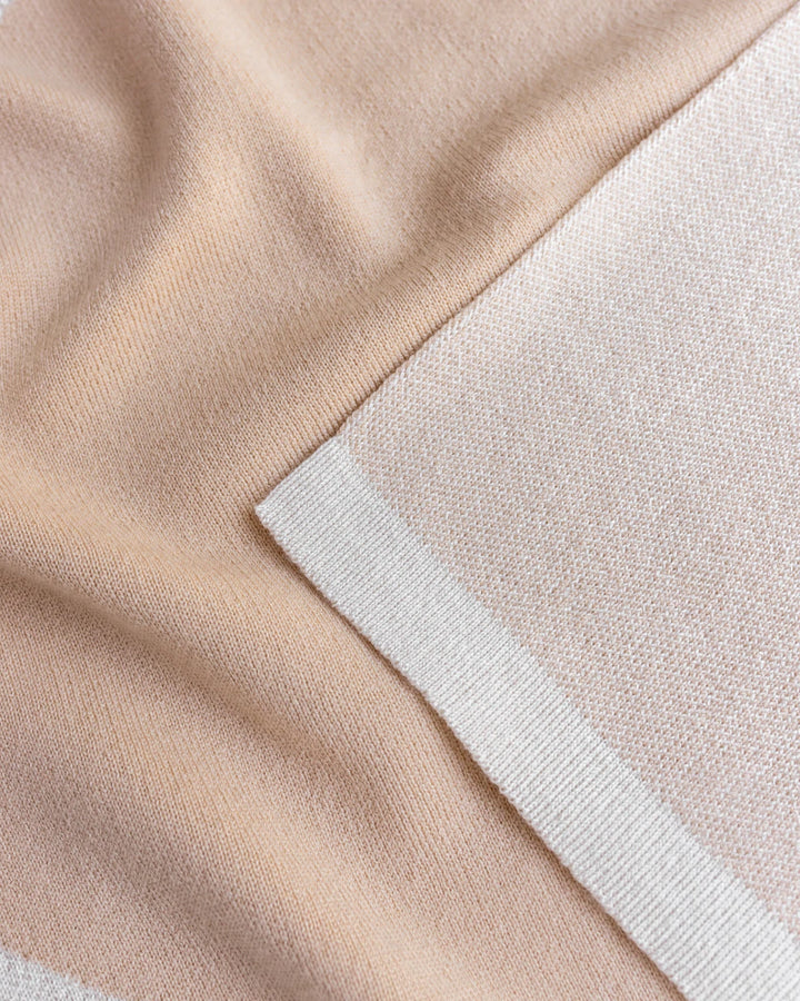 Hvid Knitwear organic merino wool large baby kids blanket Folie in rust brown apricot blush pink with modern geometric pattern for newborn