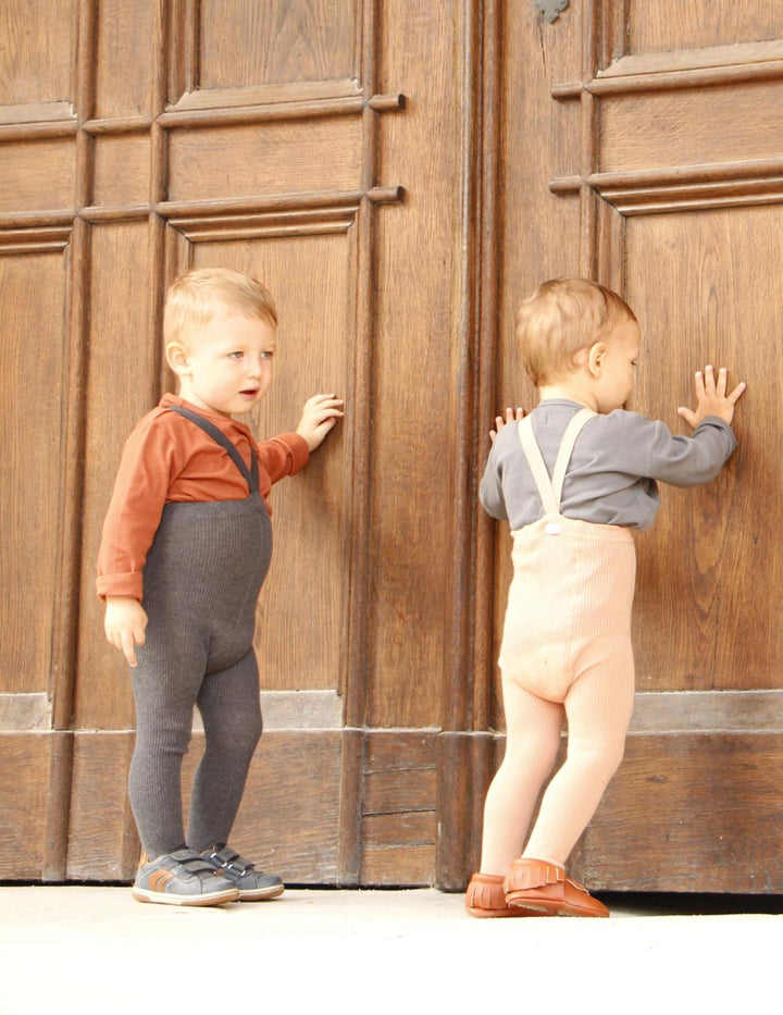 Toddler boys wearing cream and Silly Silas Dark grey blend cotton tights with braces/suspenders