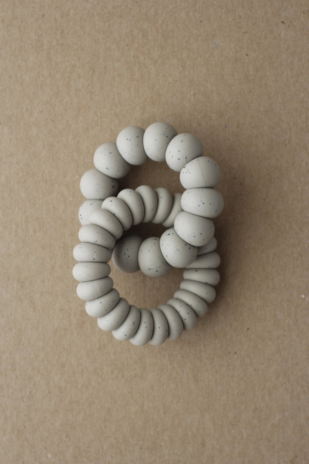 blue stone taupe speckled silicone bead teether rings