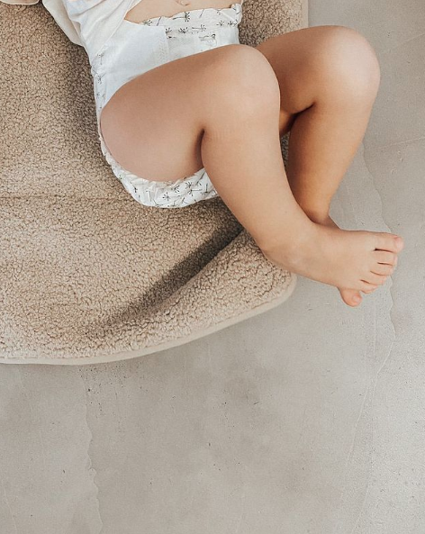 Baby legs on Beige white cream ecru  chunky teddy change mat portable with strap