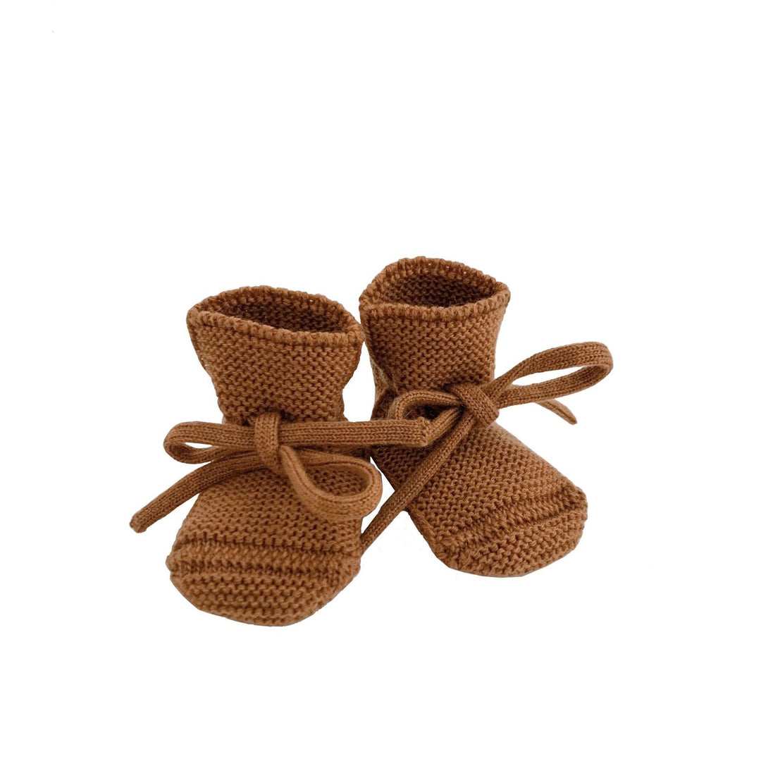 Pair of brown, rust, stone baby knitted booties with tie