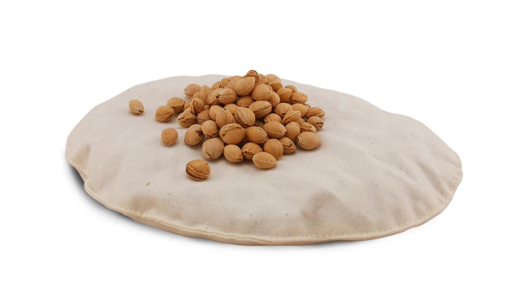Tan heat pad with cherry stone on top