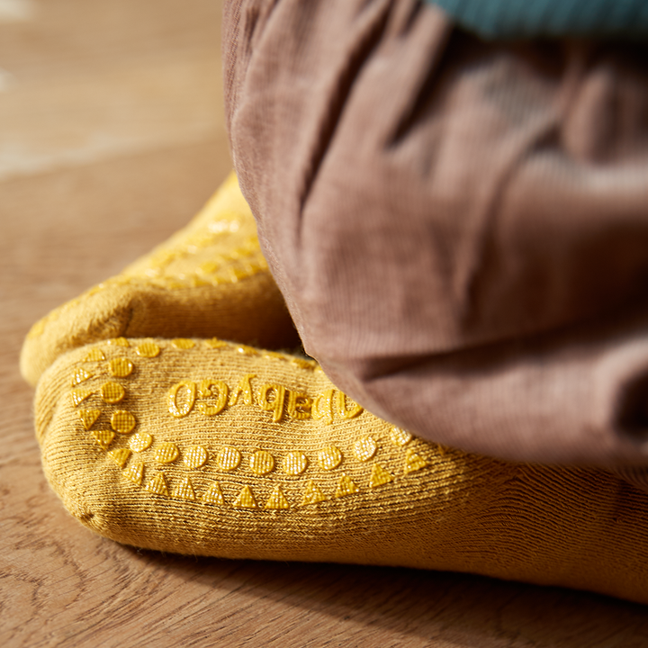 GoBabyGo cotton Terry non-slip socks with rubber pads in mustard yellow